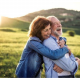 Aging at Home - Happy Canadian couple 55+ celebrating life with a reverse mortgage